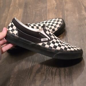 Vans Men's Checkered Black and White Slip-On Sneakers